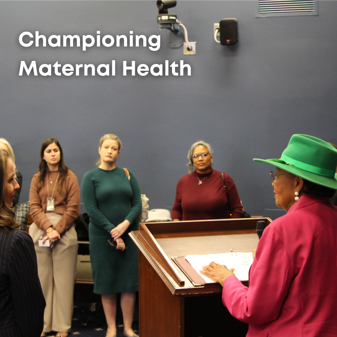 Rep. Adams speaks at a podium