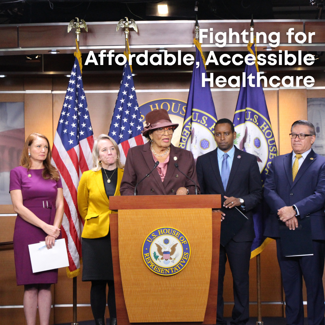 Rep. Adams at speaks at a podium