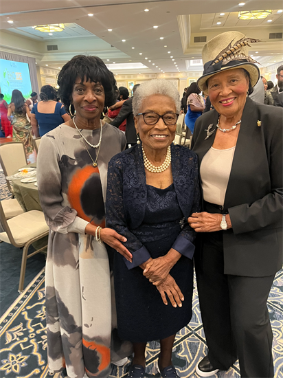 Rep. Adams with Reps. Foushee and Clayton posing for a photo